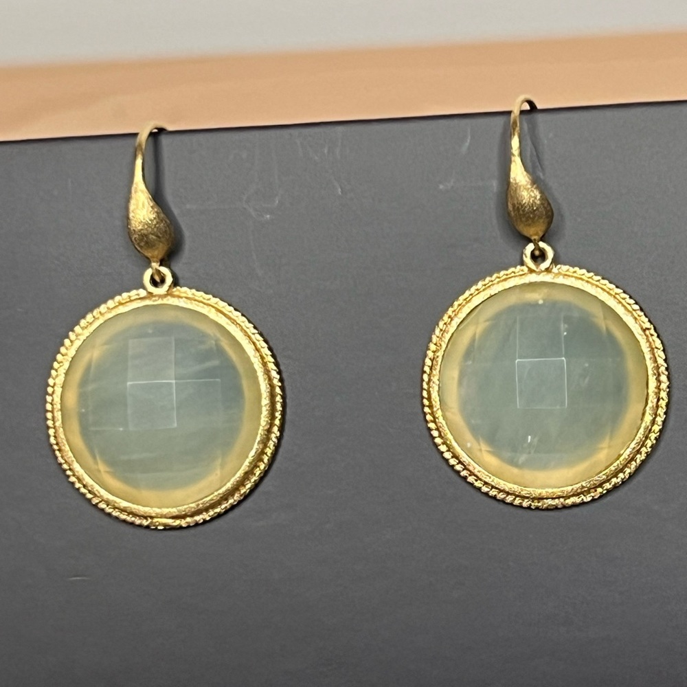 Gold earrings with pale green stone